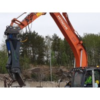 Raudan leikkaus kaivinkoneella – tehokkaat metallileikkurit
